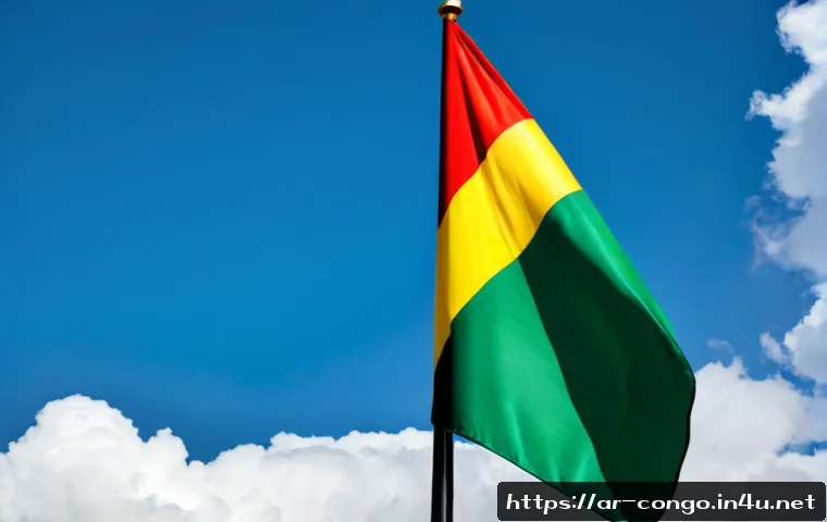콩고 공화국의 국기와 그 의미 - Photorealistic close-up of the Republic of the Congo national flag waving clearly in a gentle breeze...